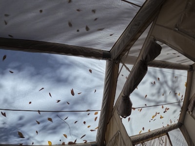 Side view of the modular float tent in suspended mode with adjustable height straps.