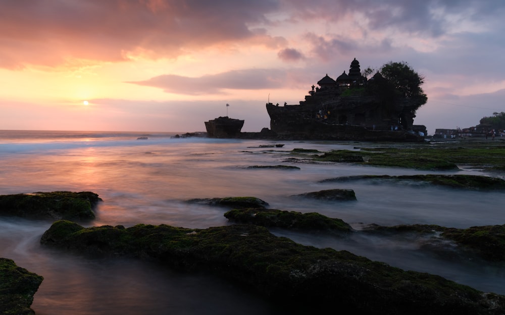 a castle on the shore of a body of water