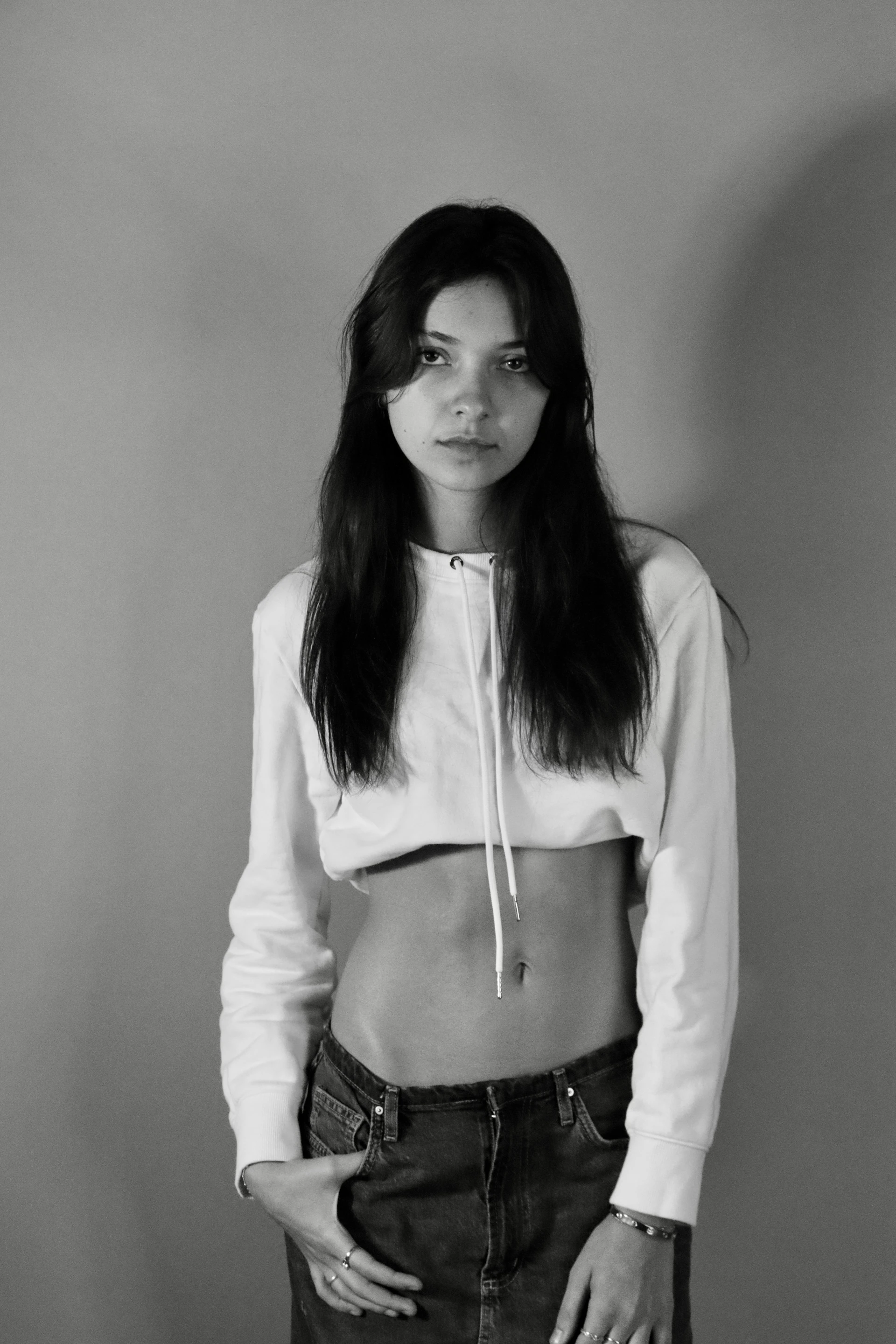 person wearing grey knit sweater