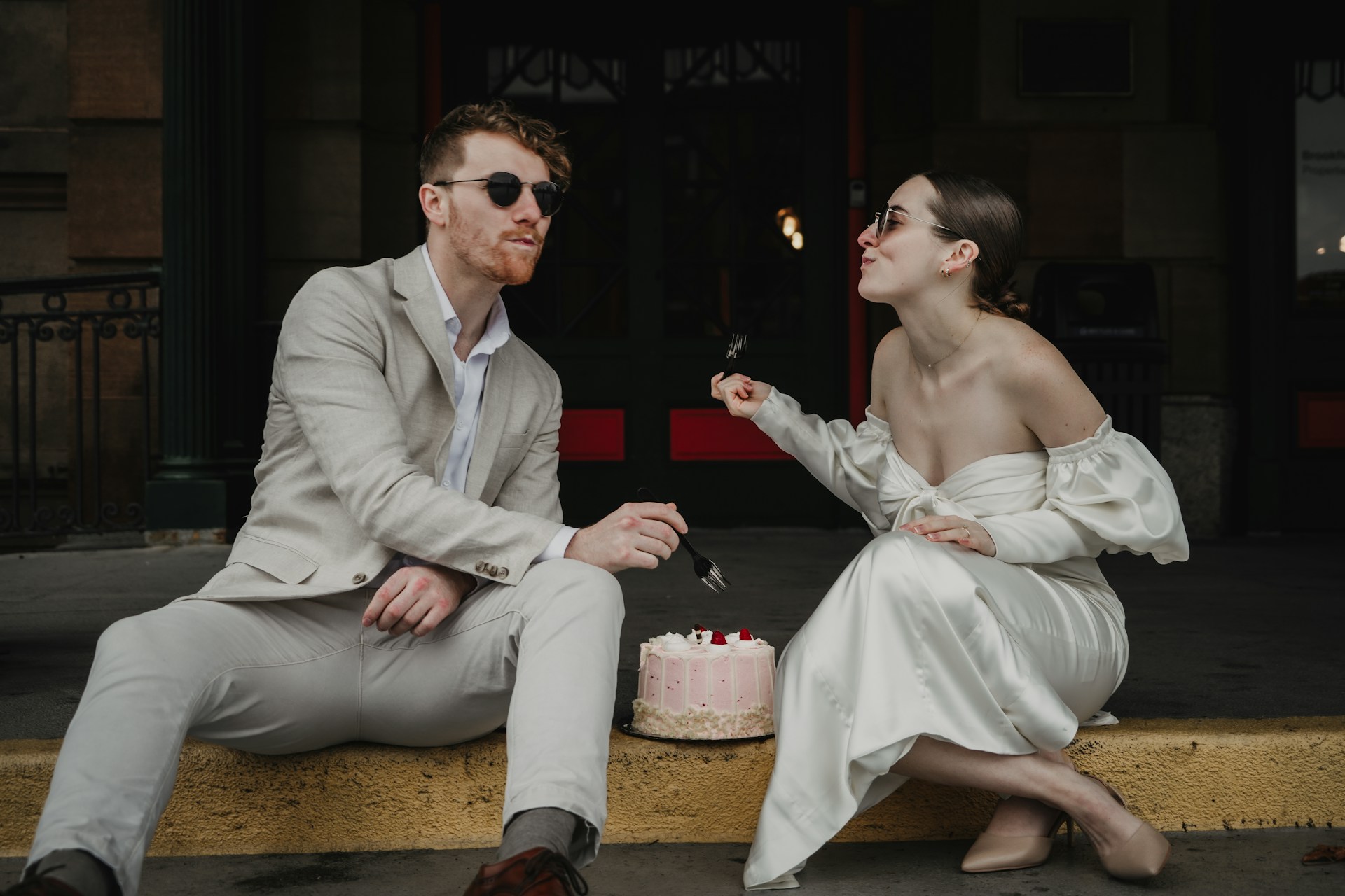 a man and a woman sitting next to each other