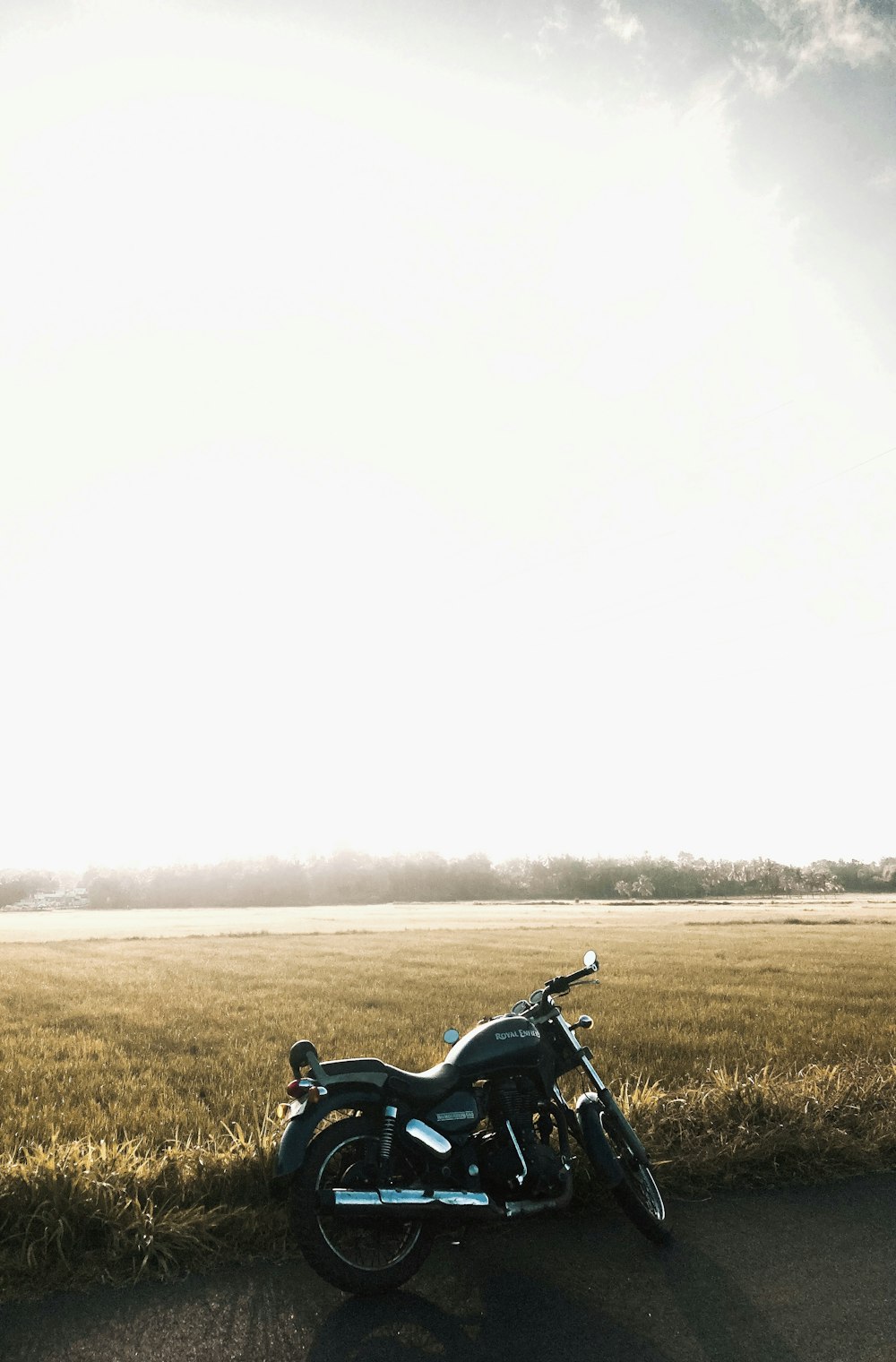 a motorcycle parked on the side of a road