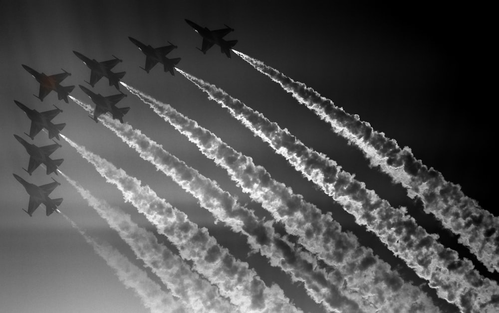 a group of airplanes flying in formation in the sky