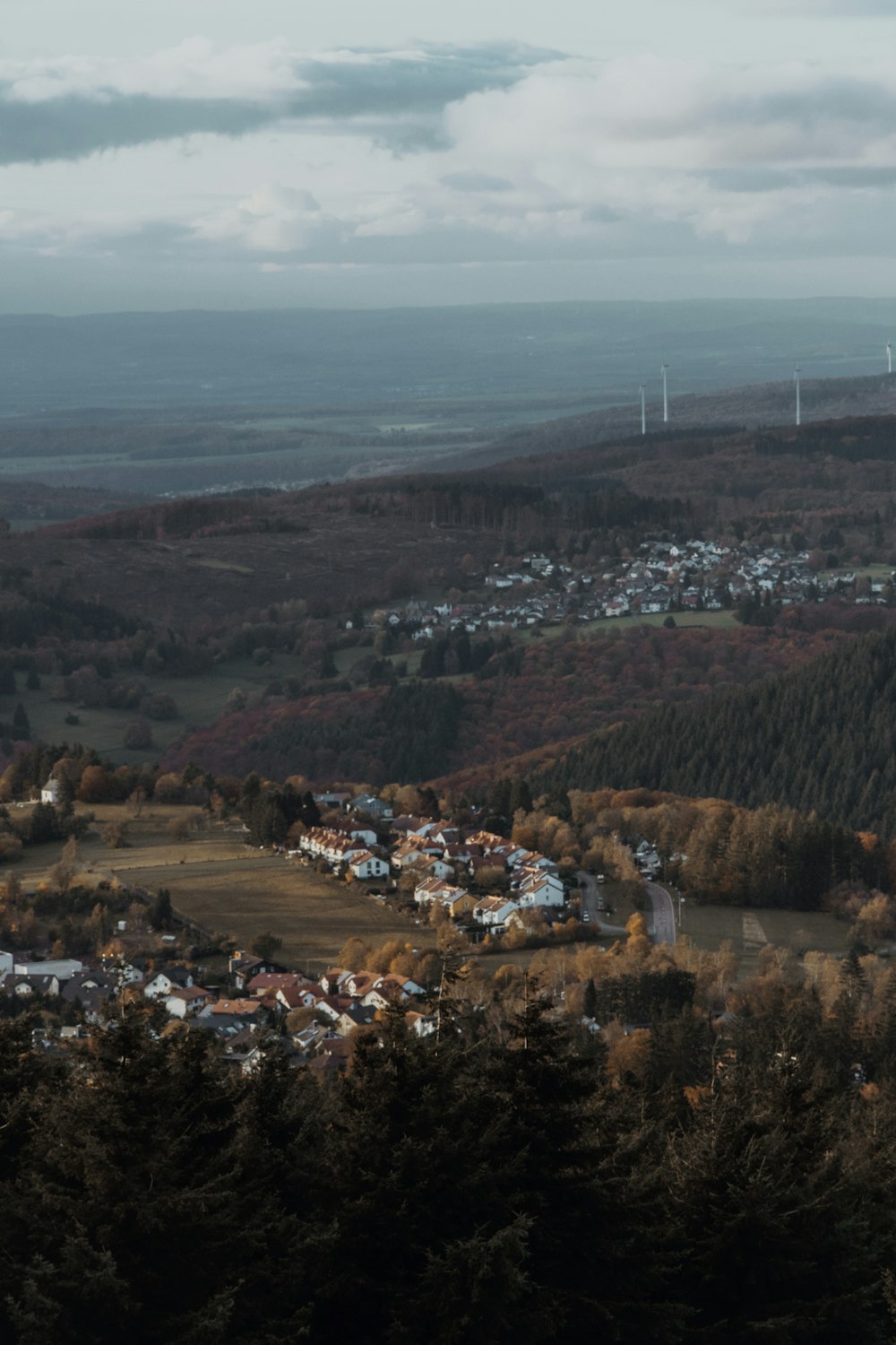 a view of a town from a hill