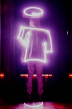 A serene angelic figure surrounded by radiant light evoking a sense of divine connection.