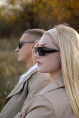 a man and a woman sitting next to each other