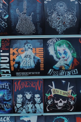 A collection of graphic images featuring various themes and personalities, including a detailed guitar design with text, an octopus illustration, a basketball player with the name 'Kobe,' a character resembling a clown with makeup, four individuals with dark makeup and hairstyles in a rock band style, and a skull with roses and guns symbolizing a famous rock band.