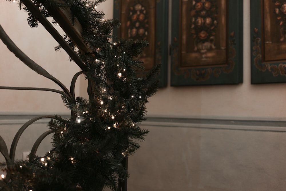 a decorated christmas tree in a corner of a room