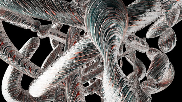 A complex and abstract composition featuring interconnected, fluid-like structures with swirling patterns. These elongated and twisting forms are primarily translucent with hints of dark blue, white, and red, against a stark black background. The interplay of light and texture creates an intricate and dynamic visual effect.