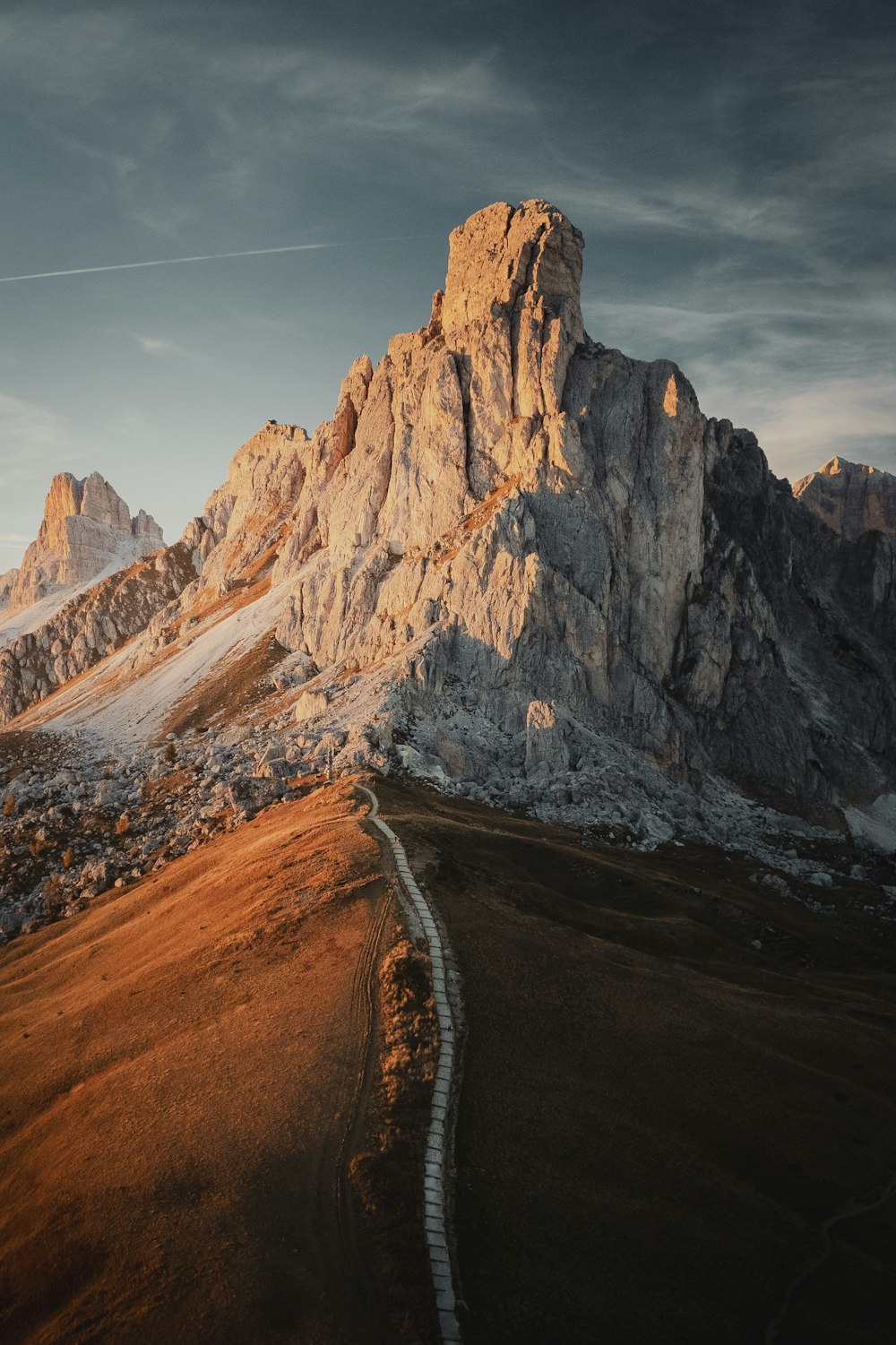 a mountain with a road going through it