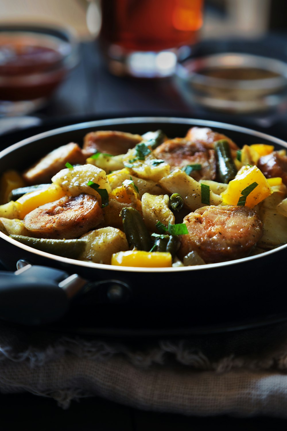 a pan filled with food sitting on top of a table