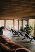 A cozy lounge area with plush seating and calming natural elements.