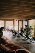 A peaceful lounge area with soft seating and views of the thermal spa gardens.