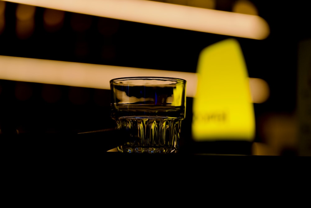 a shot glass sitting on top of a table