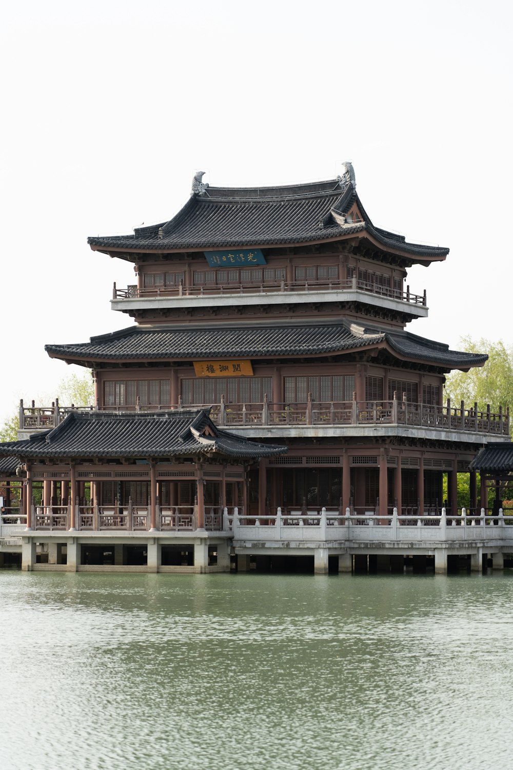 a large building sitting on top of a body of water
