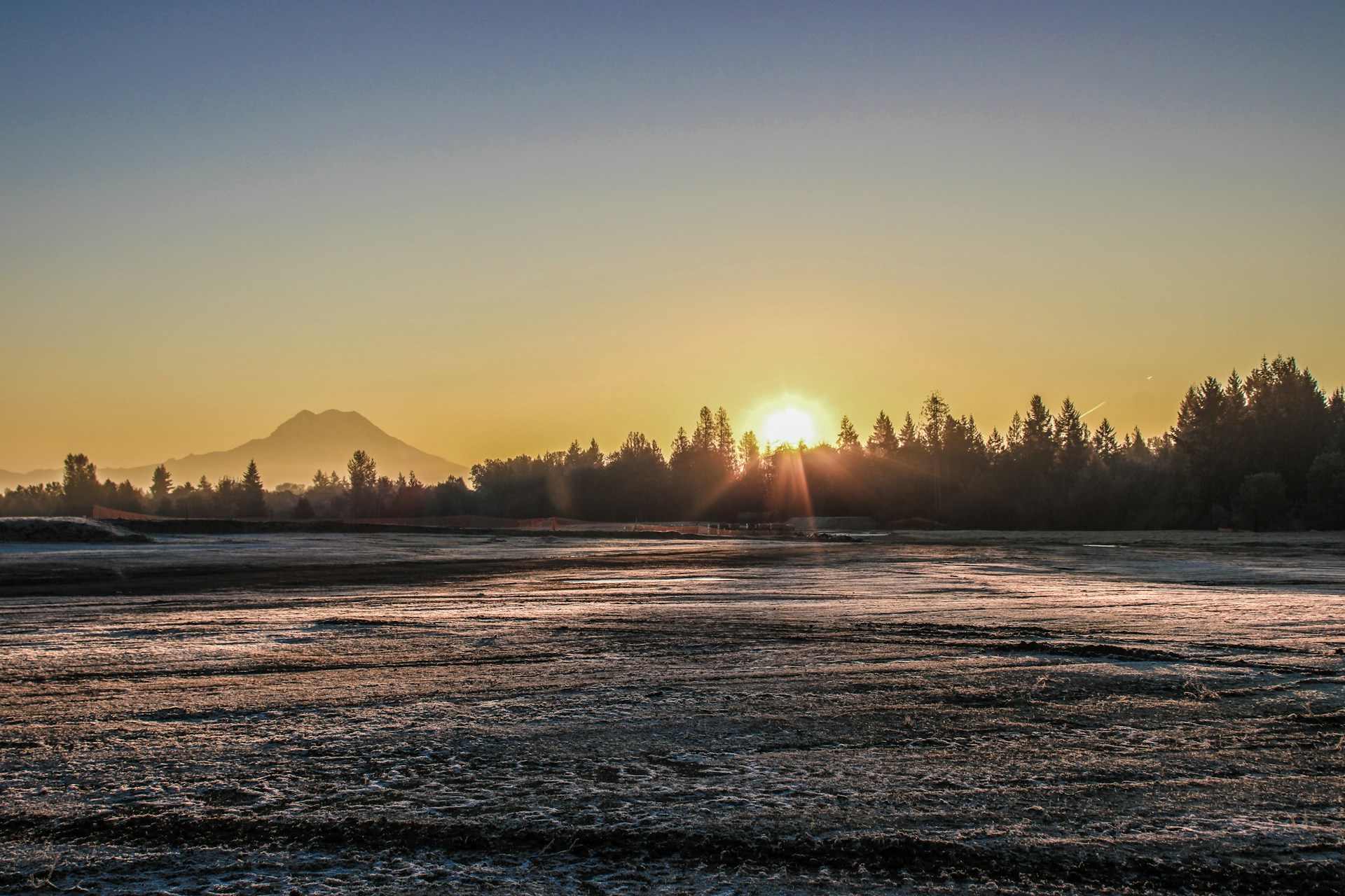 woman wearing yellow long-sleeved dress under white clouds and blue sky during daytime