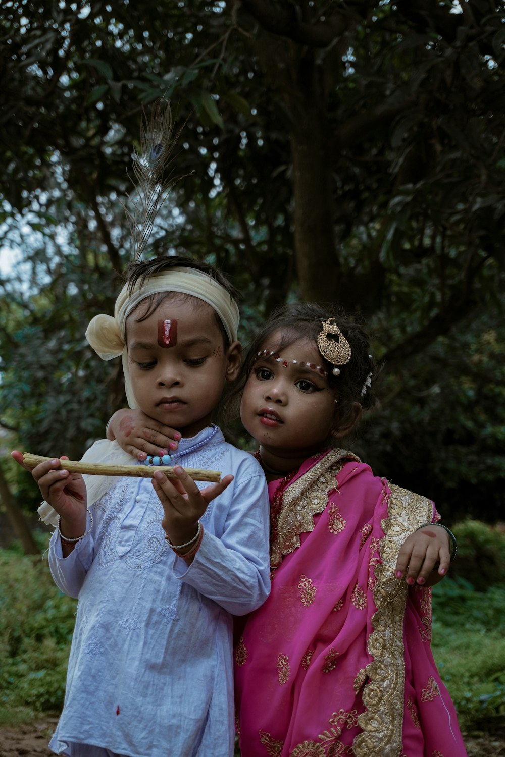 two little girls standing next to each other