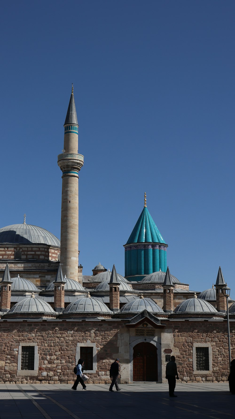 a large building with a blue dome on top of it