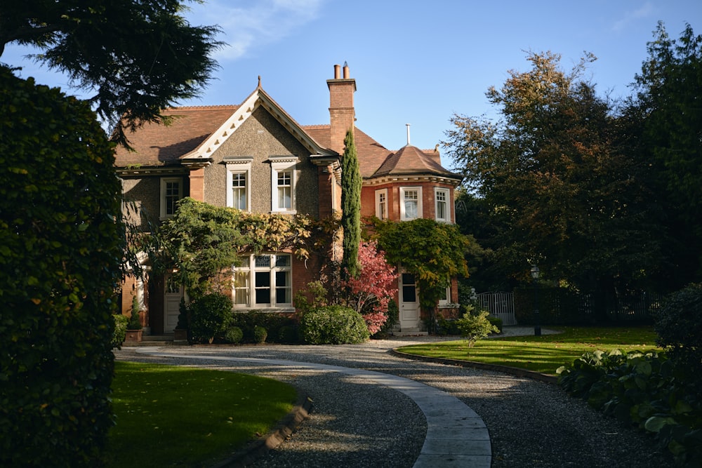 a large house with a driveway leading to it