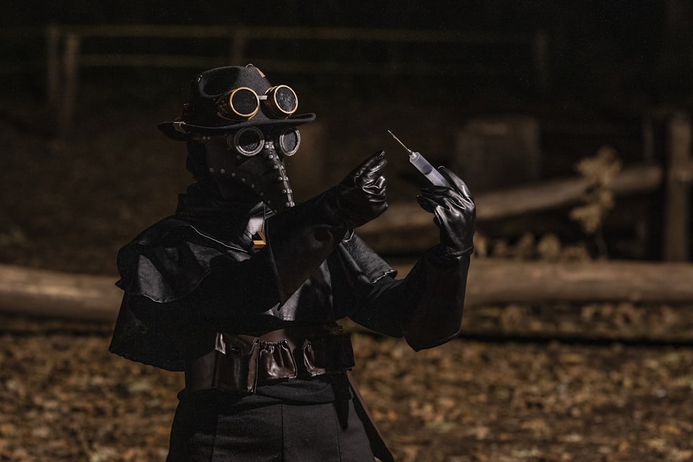 a man dressed in a costume and gas mask
