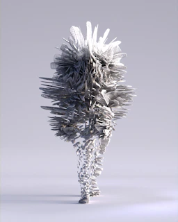 Artistic composition of sculptural object fragments in dynamic, layered arrangement.