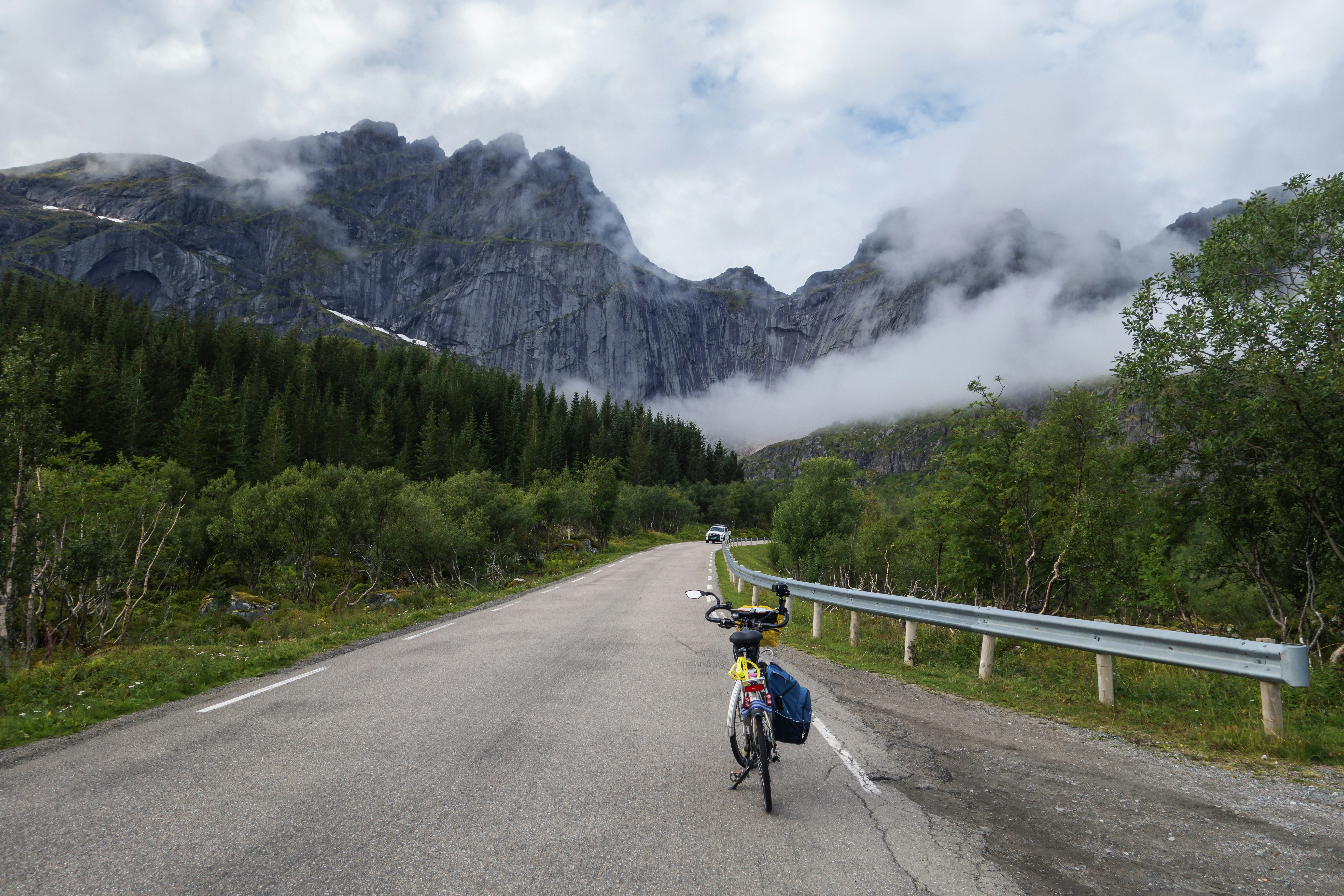 a bicycle parked on the side of a road