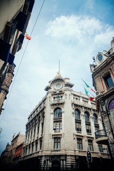 a tall building with a clock on the top of it
