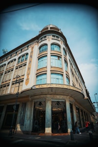 a tall building with a clock on the top of it