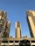 Modern residential buildings with clear skies in an urban setting.