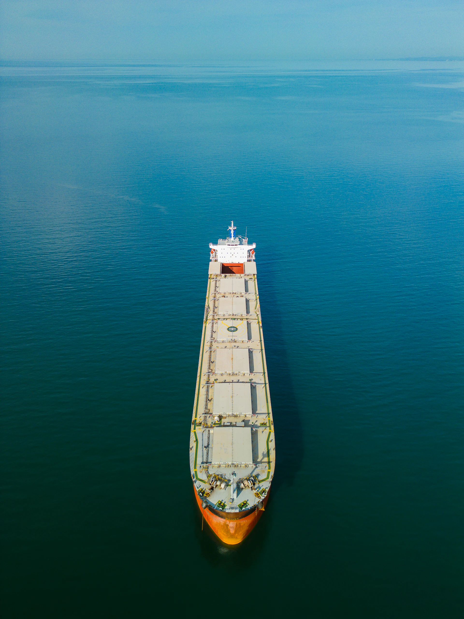 a large boat floating on top of a large body of water