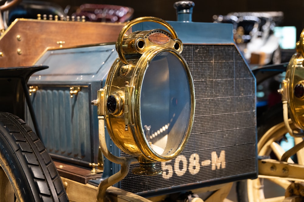 a close up of an old fashioned vehicle