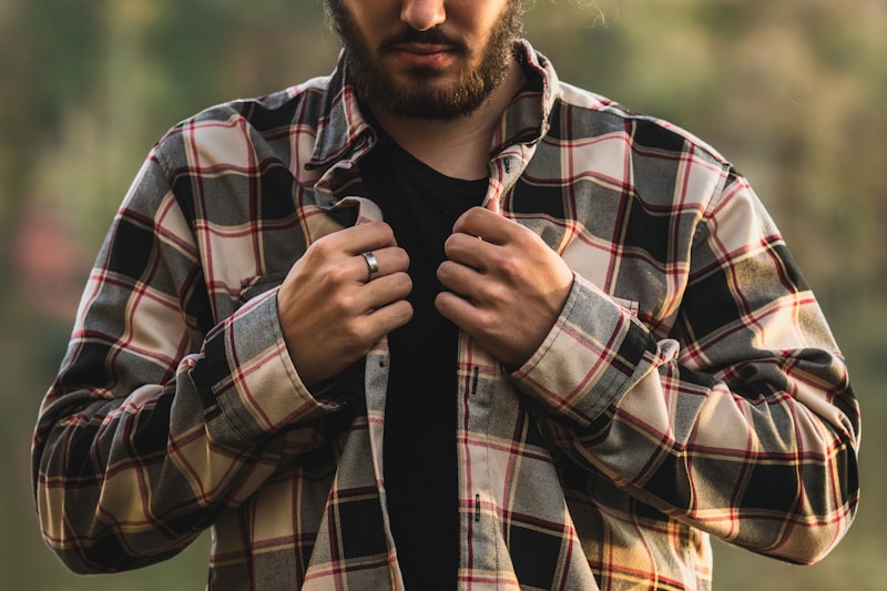 a man with a beard and a black shirt