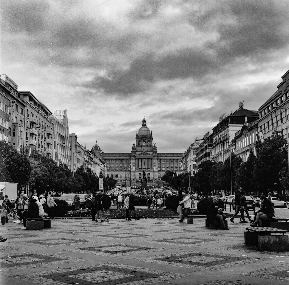 a black and white photo of a city square