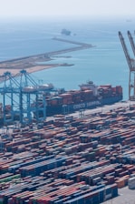 a large cargo ship docked at a port
