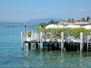 Outdoor deck with custom woodwork overlooking a coastal landscape.