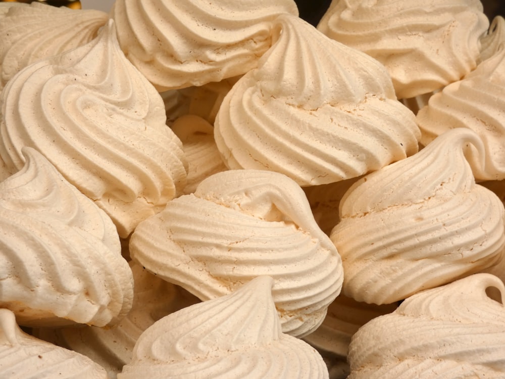 a pile of meringue cookies sitting on top of a table