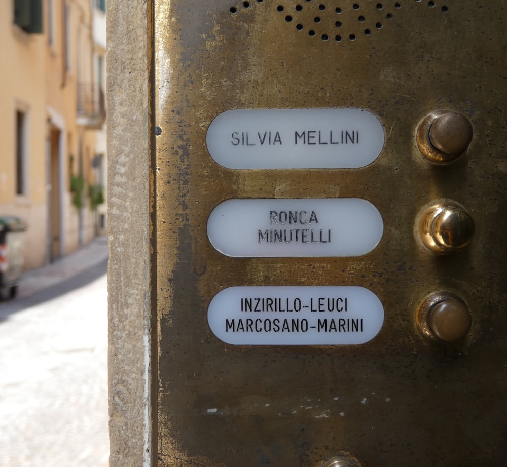 a close up of a street sign with a building in the background