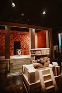 a room filled with a statue and other items
