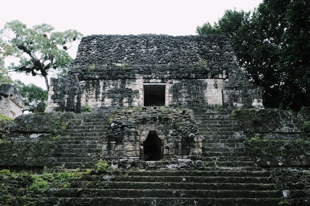 a stone building with steps leading up to it