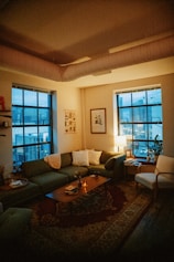 a living room filled with furniture and a fire place