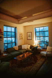 a living room filled with furniture and a fire place