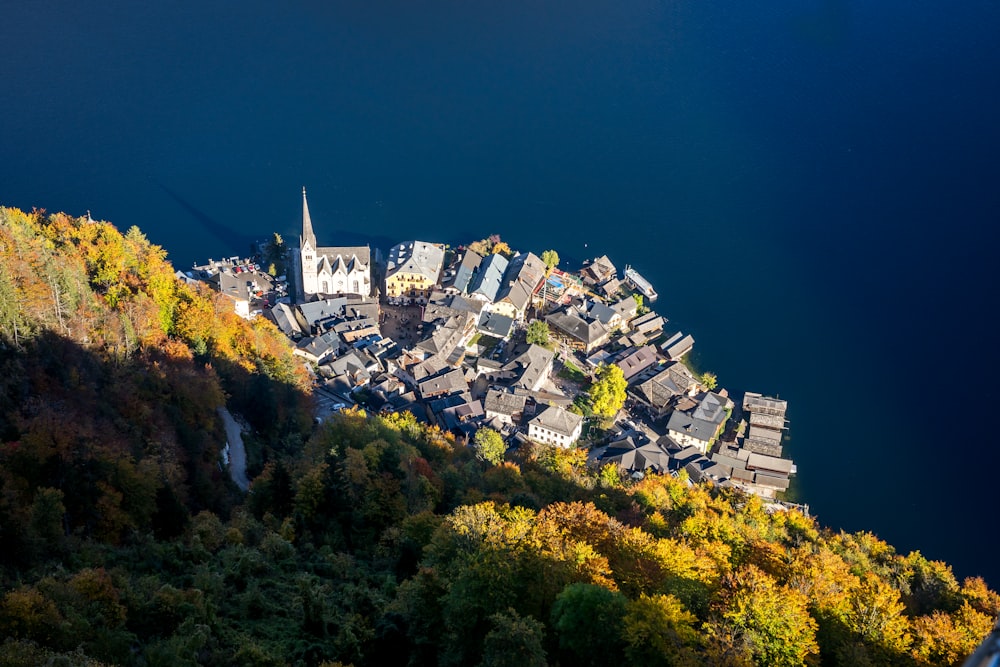 an aerial view of a small town on a mountain