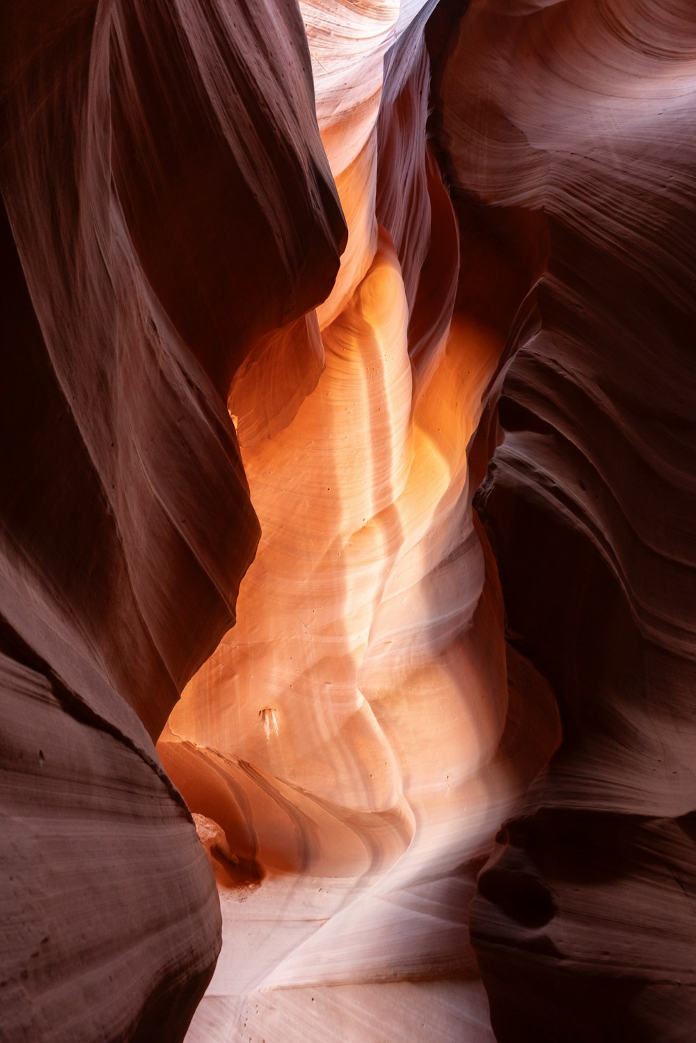 a narrow slot in the side of a canyon