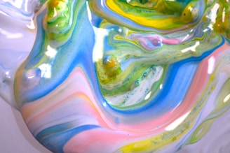 A glowing, swirling mixture of vibrant colors symbolizing magical transformation.