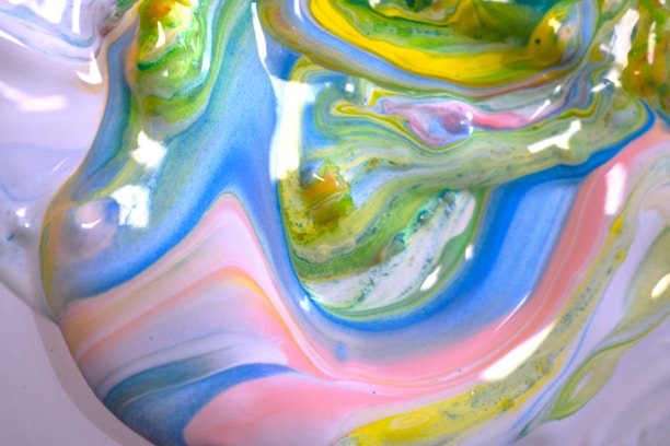 A glowing, swirling mixture of vibrant colors symbolizing magical transformation.