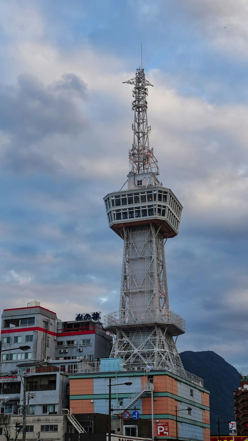 a very tall tower with a sky background