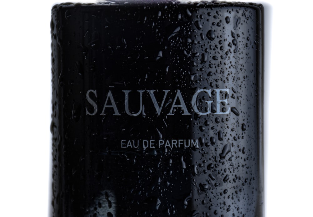 a bottle of sauvage eau de parfum on a white