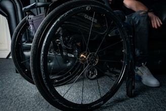 Close-up of premium wheelchair wheels showing quality craftsmanship