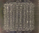 Colorful chart showing project milestones from the 2000s with handwritten notes