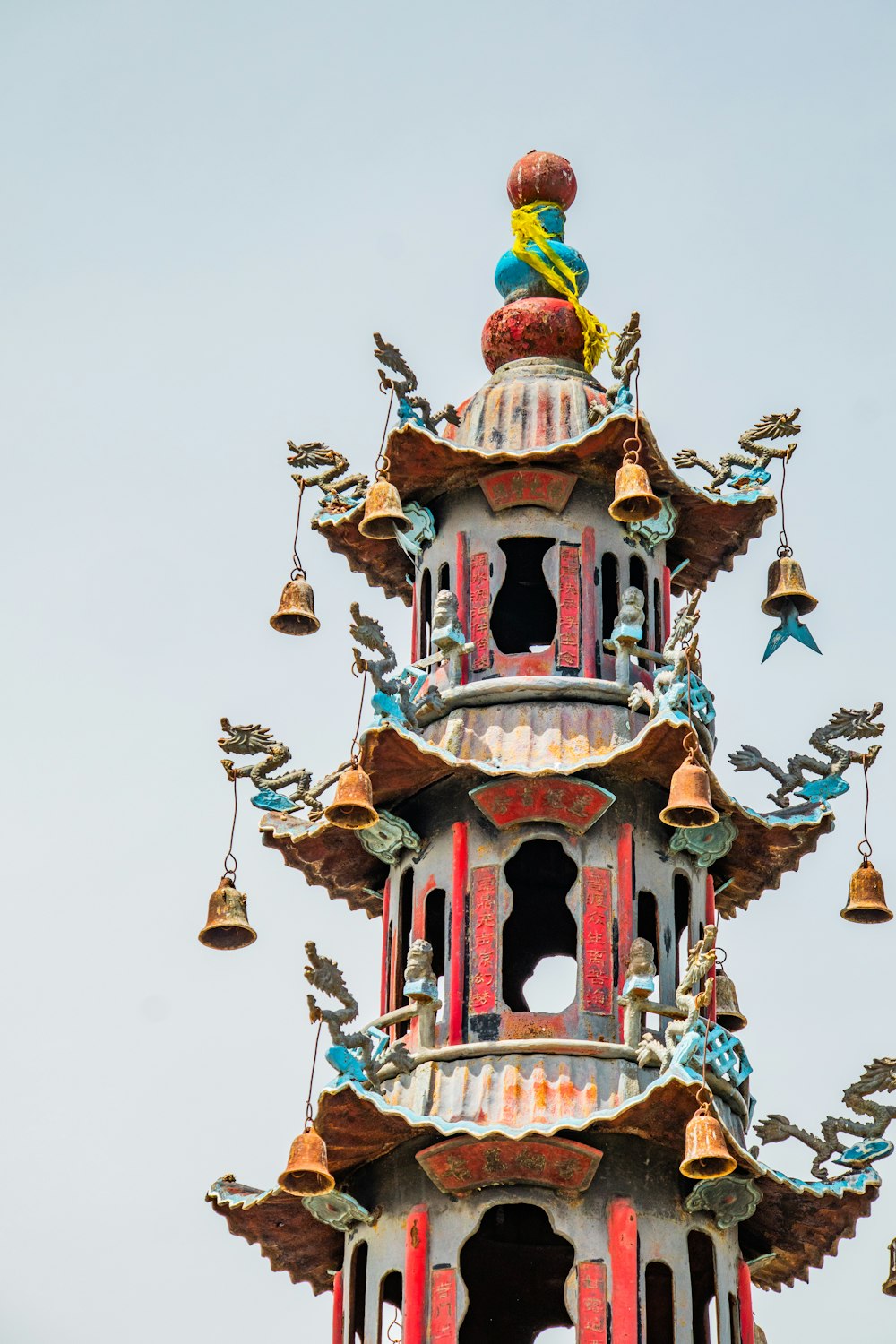 a tall tower with a clock on the top of it