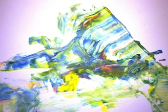 Colorful abstract painting of ocean waves with bright blues and greens.